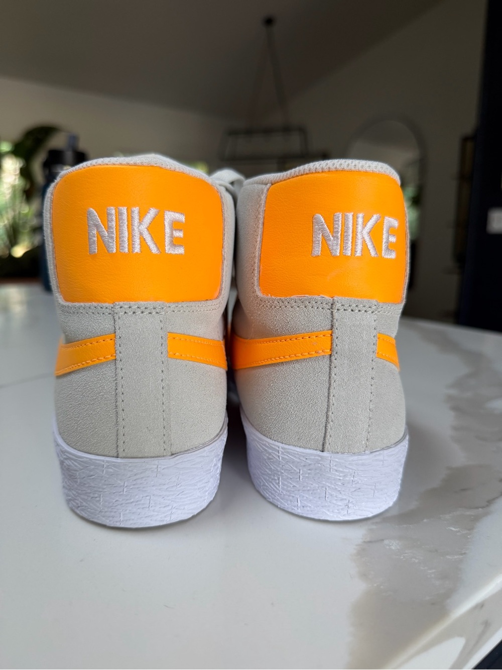 Nike Mid-Top Sneakers in Cream with Bright Orange Swoosh - Picture 2 of 5